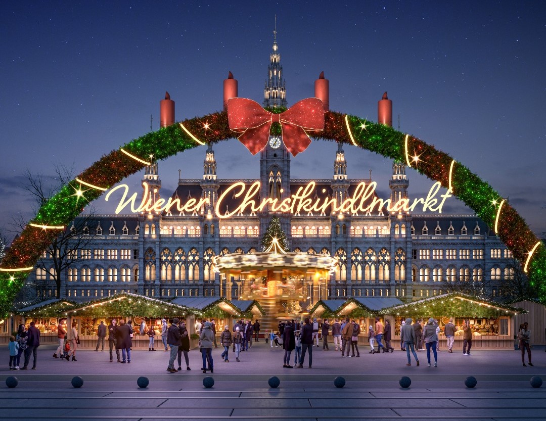 intrarea de la targul de Căciun la Viena, la Rathausplatz, pe sub o bolta acoperita de crengute de brad, luminite si funde rosii
