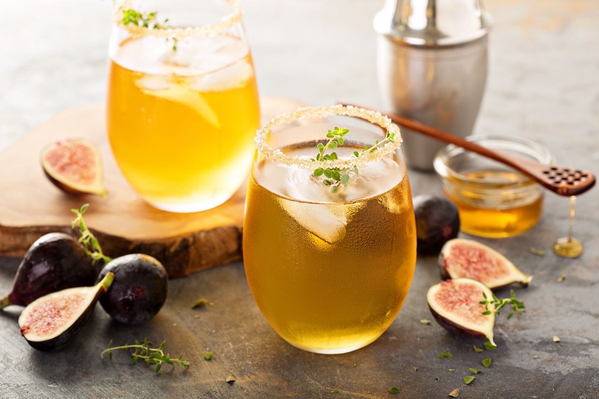 Fall cold refreshing cocktail with fig, honey and thyme